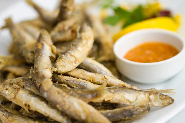 Fried sprat with souce — Stock Photo, Image