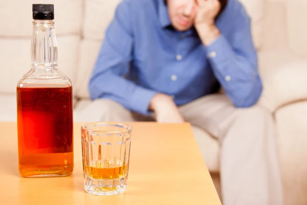 stock image Drowning sorrows in alcohol