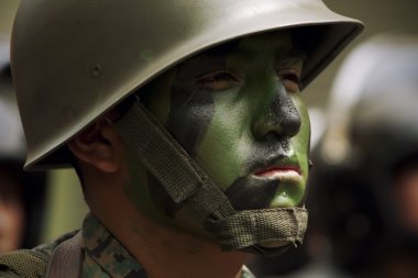 SoldierSoldier Face Painted In Green