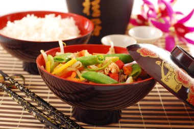 Oriental chicken with vegetables clipart