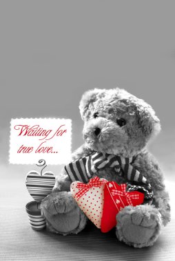 Teddy bear waiting for true love clipart