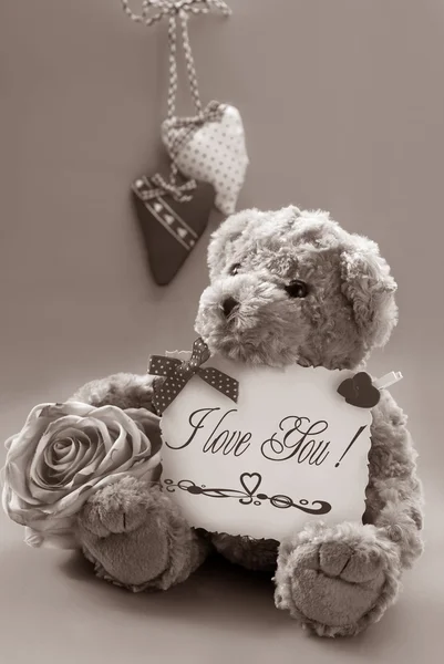 Vintage teddy bear with valentine`s greetings — Stock Photo, Image