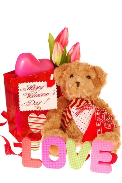 Teddy bear with valentine`s gifts — Stock Photo, Image