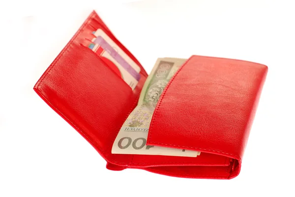白で隔離されるポーランドのお金で赤い財布 — ストック写真
