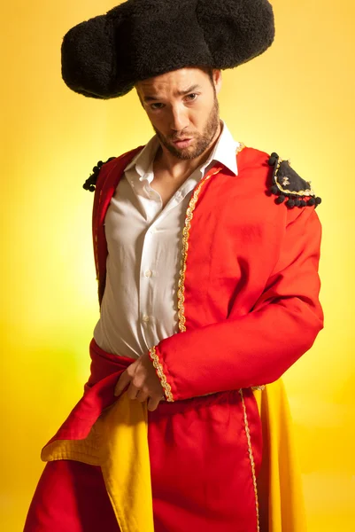 Bullfighter courage red yellow humor spanish colors — Stock Photo, Image