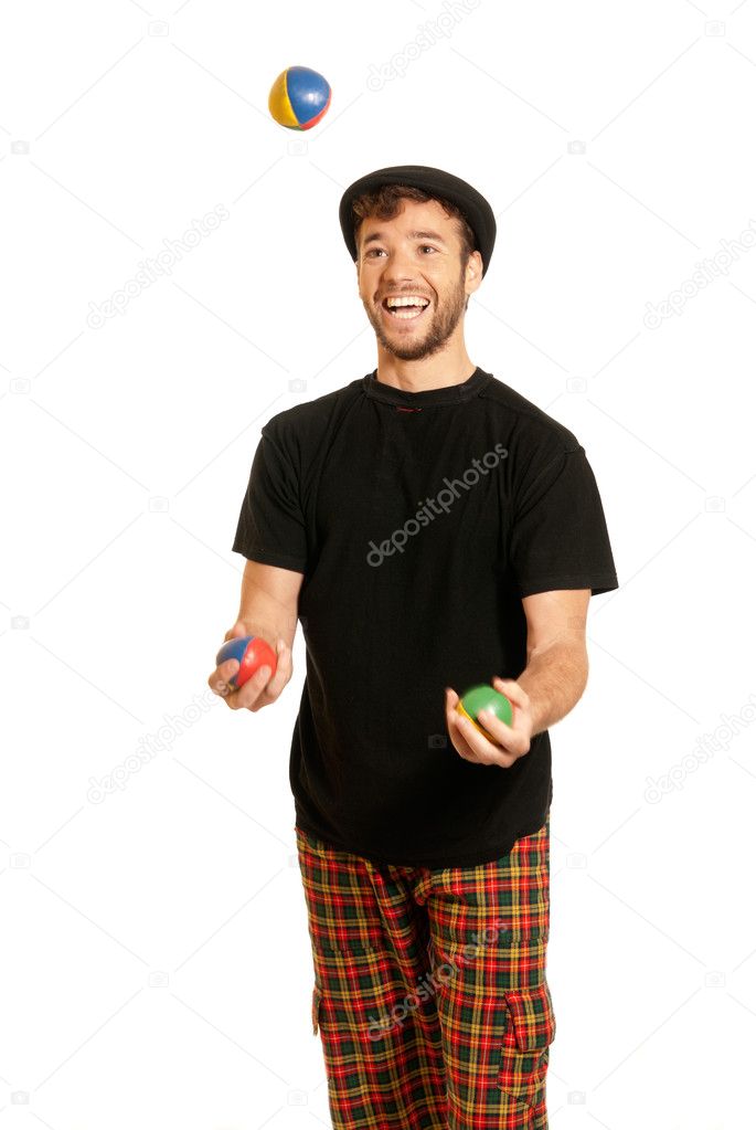 Young man juggling isolated on white background
