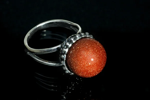 Ring on a black background with reflection — Stock Photo, Image