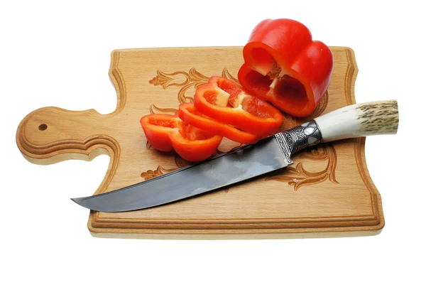 A faca uzbeque numa tábua de cortar — Fotografia de Stock