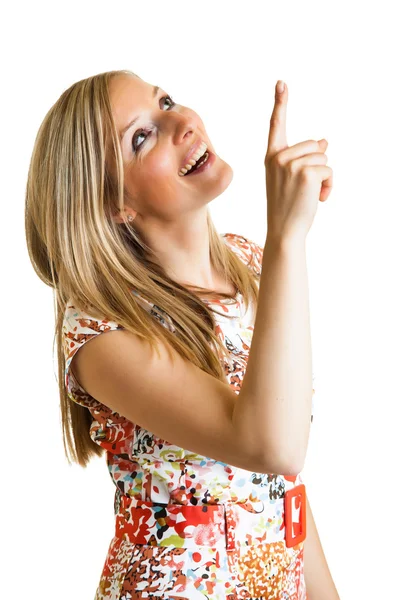 Frau zeigt mit dem Finger auf Weiß — Stockfoto