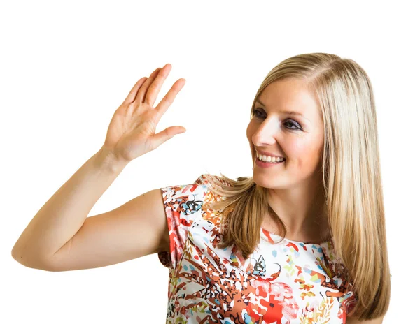 Femme pointant du doigt isolé sur blanc — Photo