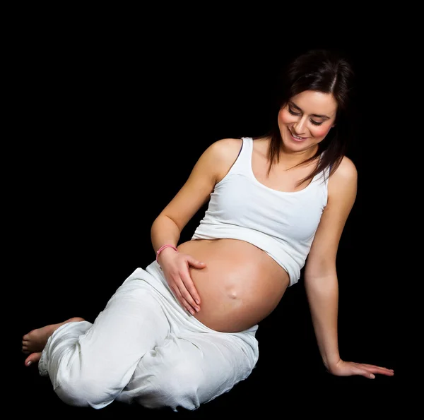 Terhes nő elszigetelt fekete — Stock Fotó