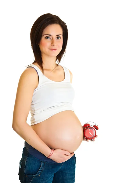 Zwangere meisje met klok verschuldigde datum concept — Stockfoto