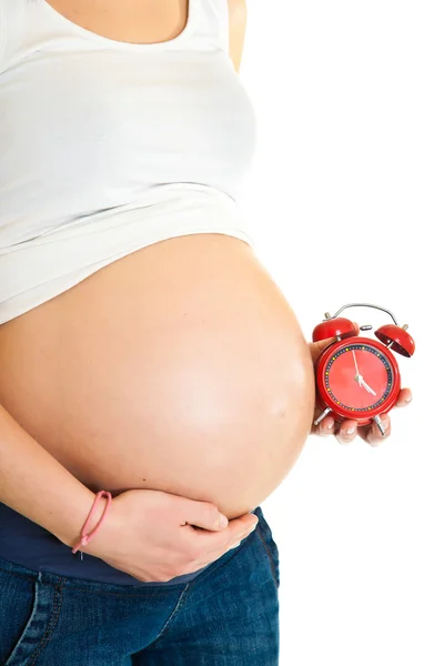 Pregnant girl with clock due date concept — Stock Photo, Image
