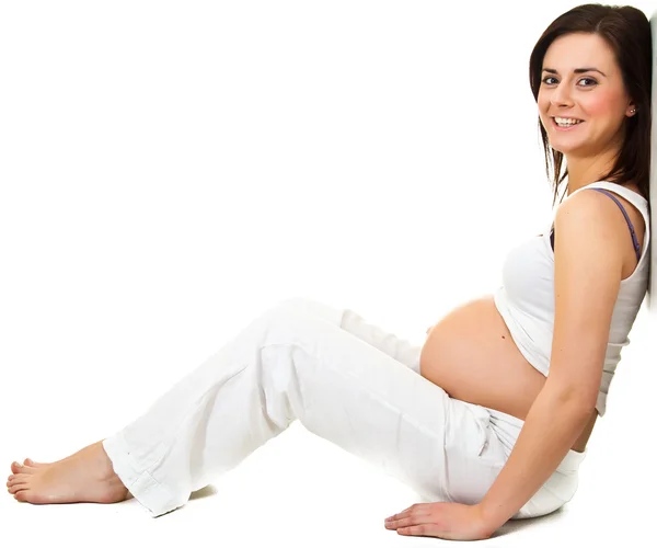 Brune enceinte isolée sur blanc — Photo