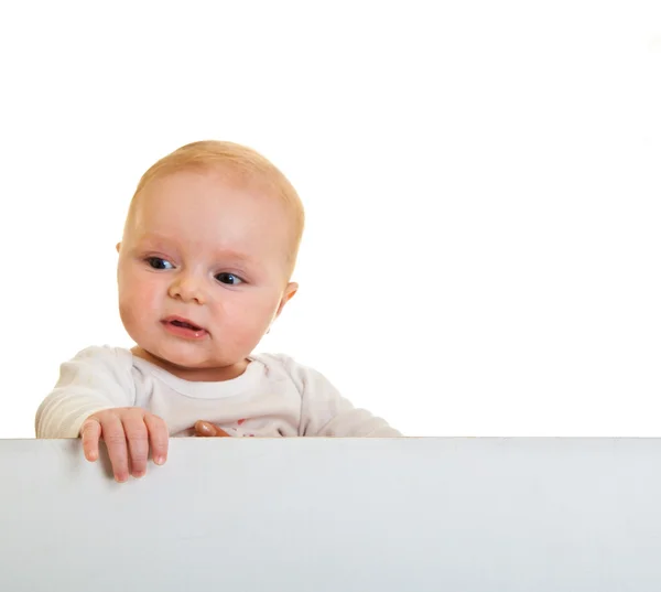 Aislado hermoso caucásico bebé detrás de pizarra blanca — Foto de Stock
