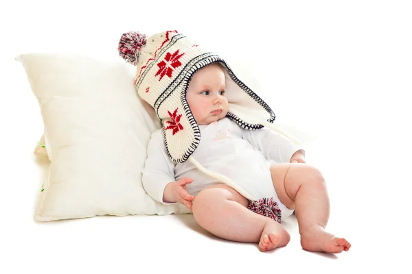 Niedliche Säugling Mädchen lernen, isoliert auf weiß sitzen — Stockfoto