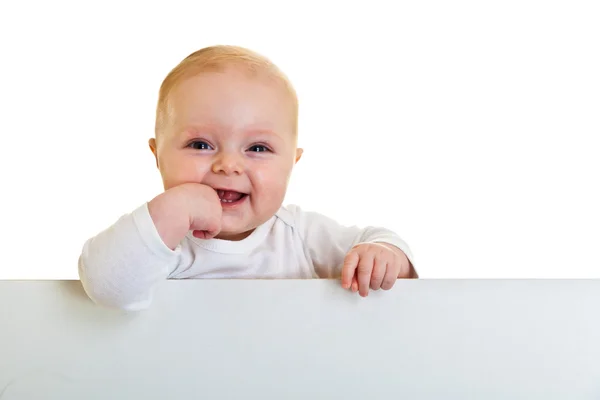 Geïsoleerde beaufiful Kaukasische baby baby achter whiteboard — Stockfoto