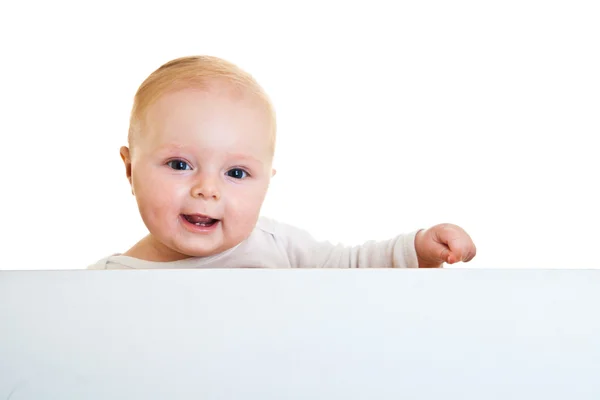 Isolato beaufiful bambino caucasico dietro lavagna bianca — Foto Stock