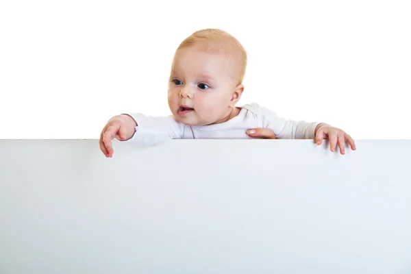 Izolované beaufiful kavkazské kojenecká baby za tabule — Stock fotografie