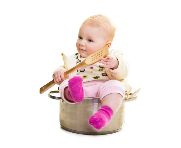Infant in cooking pan isolated on white — Stock Photo, Image