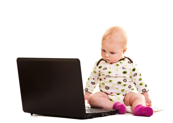 Infant with a notebook — Stock Photo, Image