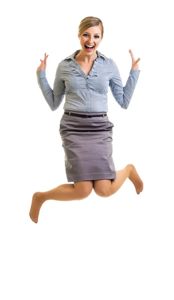 Ділова жінка стрибає з щастям ізольовано на білому — стокове фото