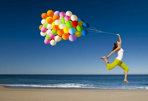 Springen mit Ballons Stockfoto