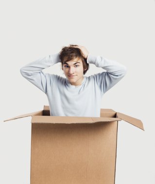 Man inside a card box clipart