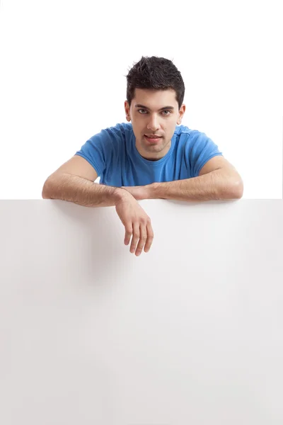 stock image Man holding a blank billboard