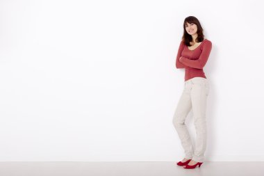 Woman against a white wall clipart