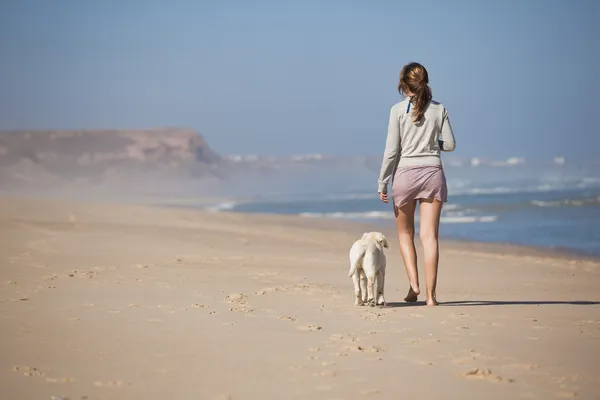 Walking with her dog — Stock Photo, Image