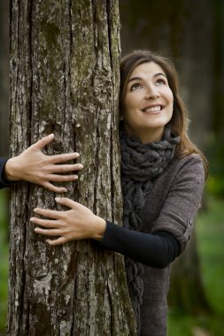 Hugging a tree clipart