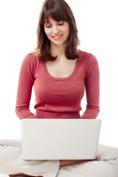 Woman working with a laptop — Stock Photo, Image