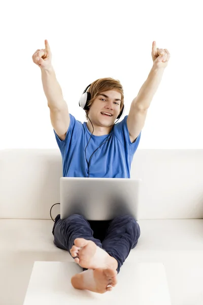 Happy man on the couch — Stock Photo, Image