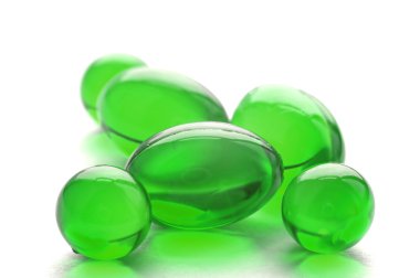 Abstract pills in green color clipart