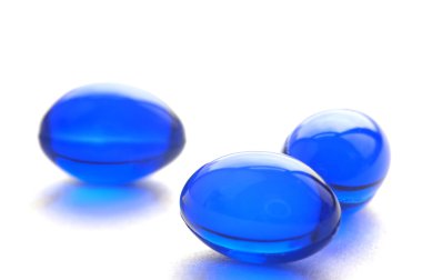 Abstract pills in blue color clipart