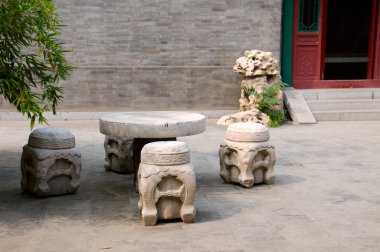 Tone furniture at Chinese garden clipart