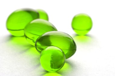 Abstract pills in green color clipart