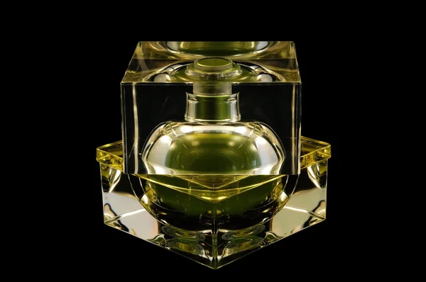 Üveg parfüm felett fekete háttér — Stock Fotó