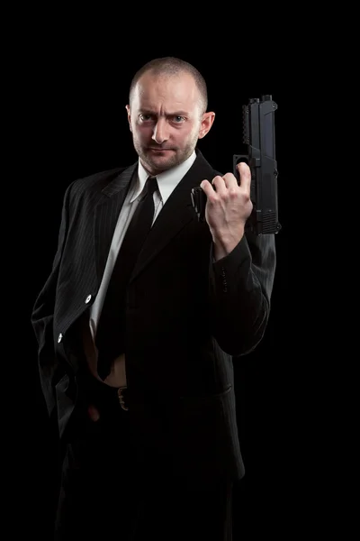 Biznesmen z pistoletem — Zdjęcie stockowe