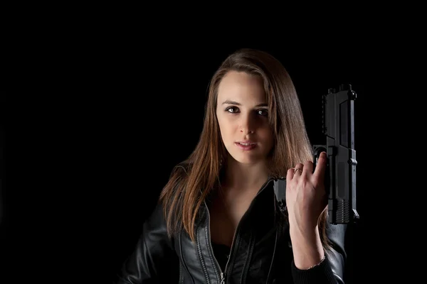 Bezpečnostní dívka s pistolí — Stock fotografie