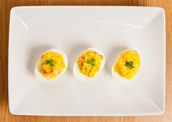 Stuffed eggs on plate — Stock Photo, Image