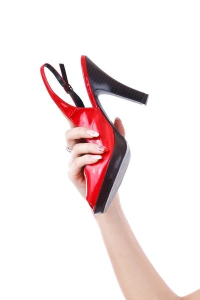 Ženské hospodářství červené boty — Stock fotografie