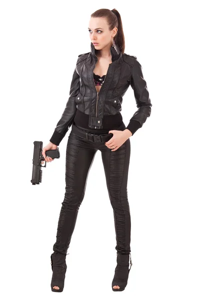 Femme à la mode avec un pistolet — Photo