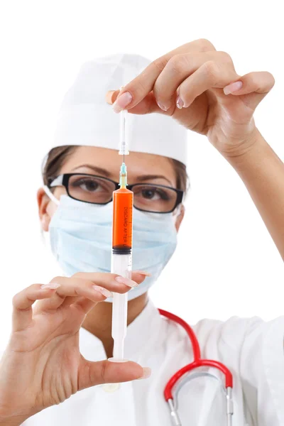 Jovem enfermeira em máscara — Fotografia de Stock