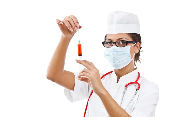 Ung sjuksköterska i mask — Stockfoto