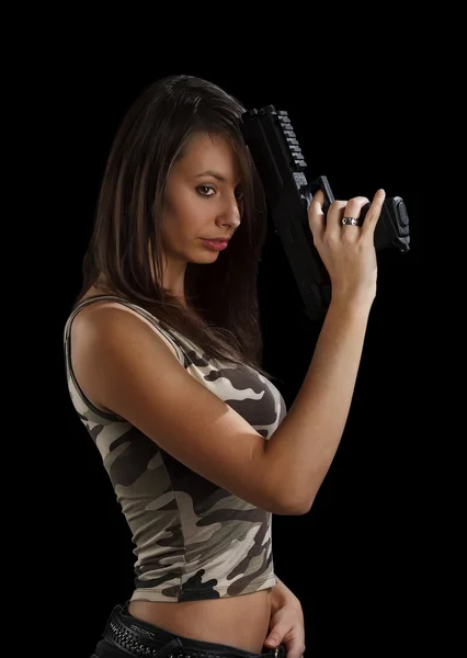 Girl holding gun — Zdjęcie stockowe