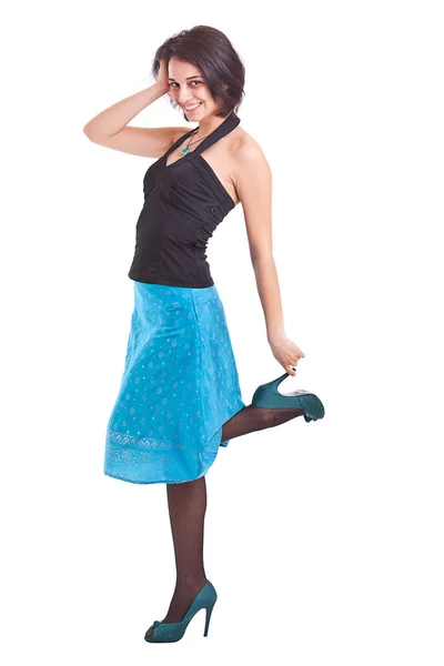 Vrouw poseren in een funky blauwe jurk Stockafbeelding