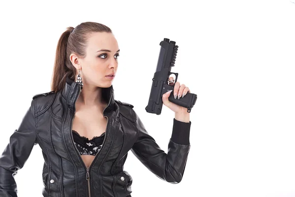 Kvinna med pistol Stockfoto