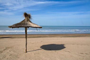 Deserted beach in Argentina clipart